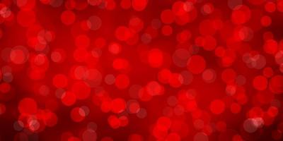 Light Orange vector background with bubbles.