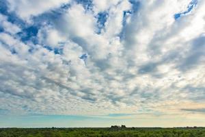 Blue sky with white clouds photo