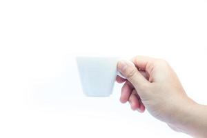 mano sosteniendo una taza de espresso foto