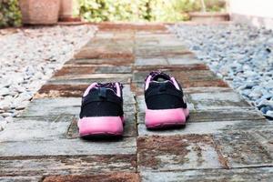 Running shoes in a home garden photo