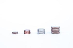 Stack of coins on a white background photo