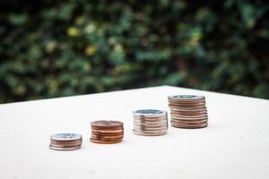 Coins on a white table photo