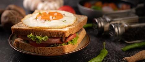 Ham and egg breakfast sandwich photo