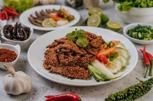 Pork liver salad with side dishes photo