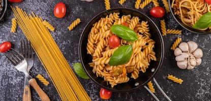 Sauteed macaroni pasta in the pan photo