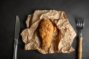 Crispy fried chicken with a knife and fork photo