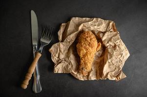Crispy fried chicken with a knife and fork photo