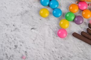 Colorful confectionary on gray background photo