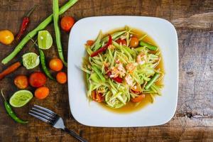 Top view of a papaya salad photo