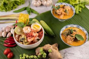 Tom yum noodles with shrimp and boiled eggs photo