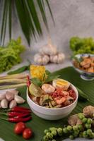 Tom yum noodles with shrimp and boiled eggs photo