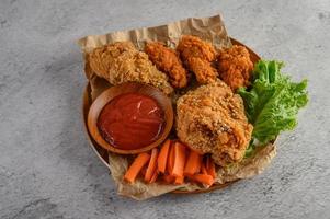 Crispy fried chicken with sauce photo