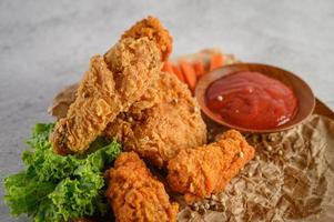 Crispy fried chicken with sauce photo