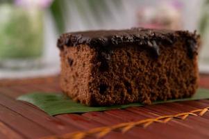 Chocolate cake on bamboo photo