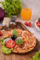 Homemade pizza on a cutting board photo