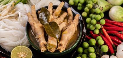 Rice noodles and chicken feet with extras photo