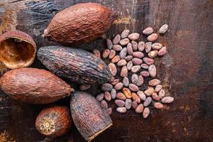 Cocoa beans on a table photo