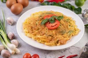 Omelet on a white plate photo