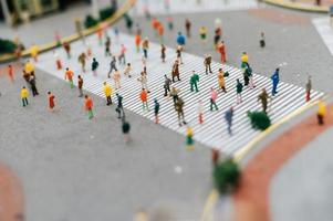 Small tilt shift people in the streets photo