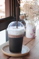 Iced coffee latte in a coffee shop photo