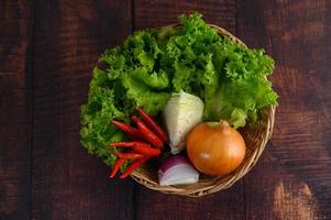 Vegetables in a wicker basket photo