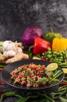 Stir-fried pork basil with vegetables photo