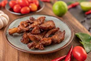 Pork cutlet with chilies and garlic photo