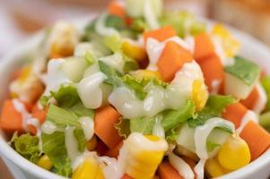 Cucumber, corn, carrot and lettuce salad