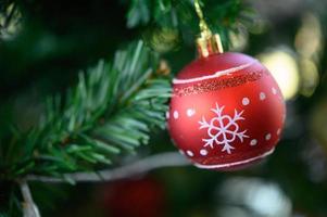 Close-up of a red Christmas tree ornament