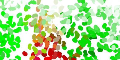 Light green, red vector background with random forms.