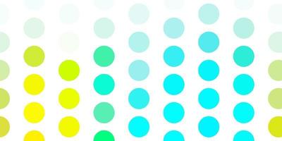 Light blue, yellow vector background with bubbles.