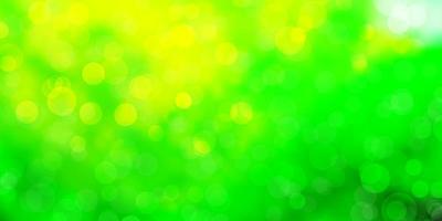 Light Green, Yellow vector background with circles.