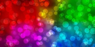 Light Multicolor vector backdrop with circles.