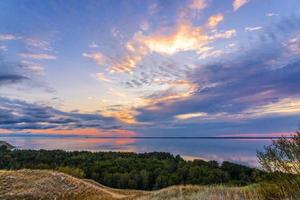 Colorful clouds at sunset photo