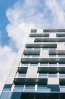 Jelgava, Latvia, 2020 - White high-rise building under clouds photo