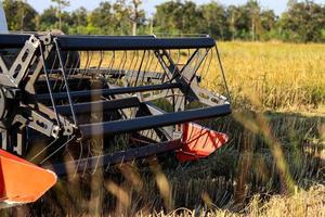 Close-up of a harvesting machine photo