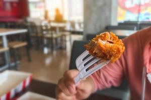 Fried chicken on a fork photo