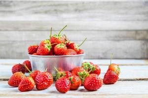 Strawberries in a metal bowl photo