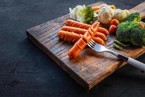 Grilled hot dogs and a fork photo