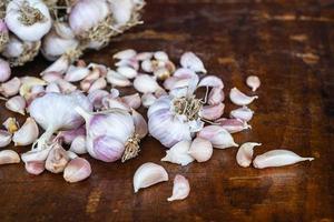 Garlic cloves on a table photo