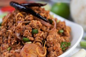 A plate of minced pork with ingredients photo