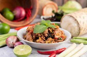 A plate of minced pork with ingredients photo