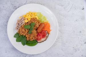 Stir-fried noodles with mixed vegetables photo