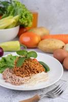 Stir-fried noodles with mixed vegetables photo