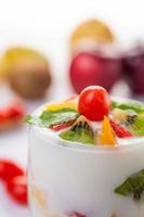 Fruit yogurt smoothie in clear glass photo