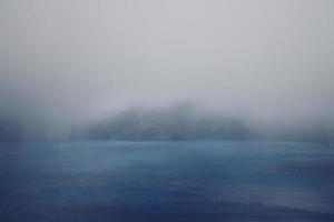 Foggy blue ocean photo