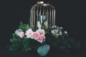 Birdcage centerpiece with flowers photo