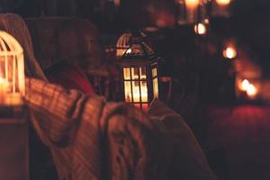 Candle lanterns with blankets photo