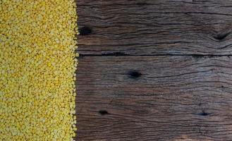 Soy beans on wooden table photo