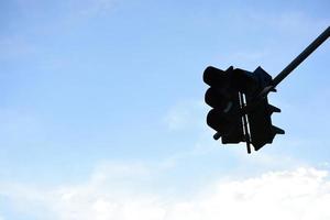 Traffic light with blue sky background. photo